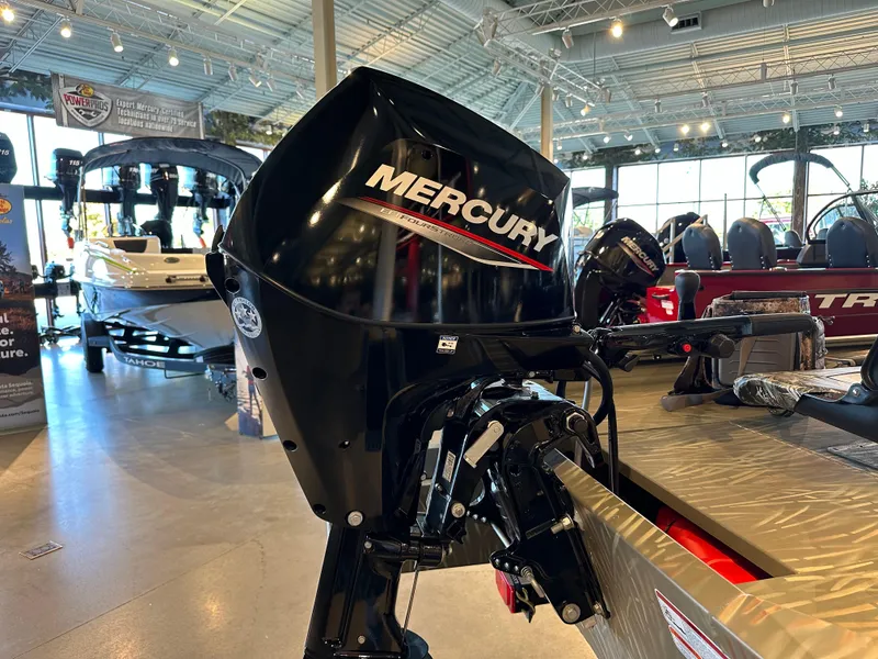Slide: The Image of Mercury outboard motor on 2025 Tracker Grizzly 1654 T Sportsman boat in showroom. - 6
