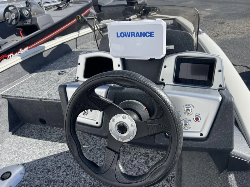 Slide: The Image of 2025 Tracker Pro Team 175 Crappie Edition boat dashboard with Lowrance fishfinder. - 10