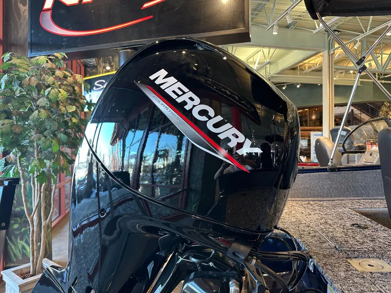 Slide: The Image of 2025 Tracker Pro Guide V-175 WT with Mercury outboard motor in showroom. - 5