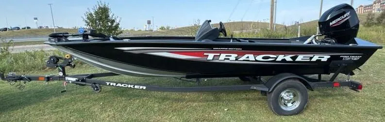 Slide: The Image of 2025 Tracker Pro Team 175 Crappie Edition boat on trailer, side view. - 2
