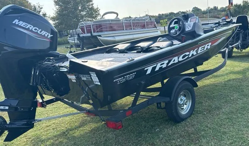 Slide: The Image of 2025 Tracker Pro Team 175 Crappie Edition boat with Mercury engine on trailer. - 3