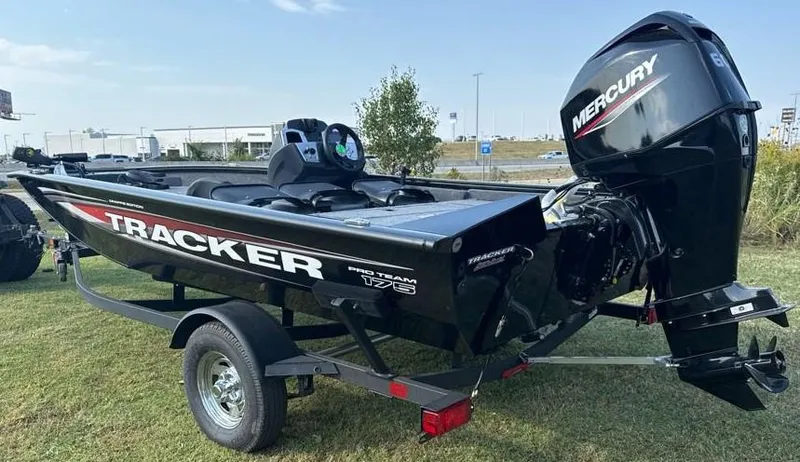 Slide: The Image of 2025 Tracker Pro Team 175 Crappie Edition boat with Mercury engine on trailer. - 5