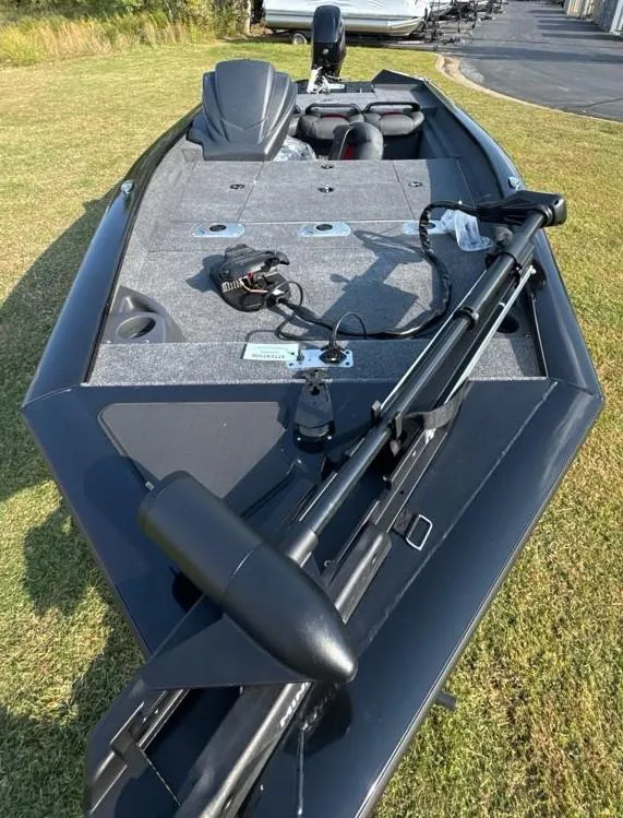 Slide: The Image of 2025 Tracker Pro Team 175 Crappie Edition boat on grass, featuring fishing equipment. - 7