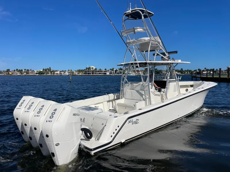 The Image of 2020 SeaVee 390Z boat with triple outboard engines on a sunny day. - 1