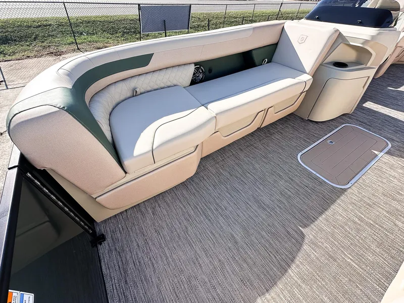 Slide: The Image of 2025 Godfrey Sweetwater Tritoon 2286 SB interior with plush seating and modern design. - 6