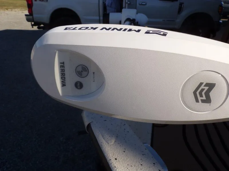 Slide: The Image of Minn Kota Terrova trolling motor on 2025 Xpress H24Bay boat, close-up view. - 16