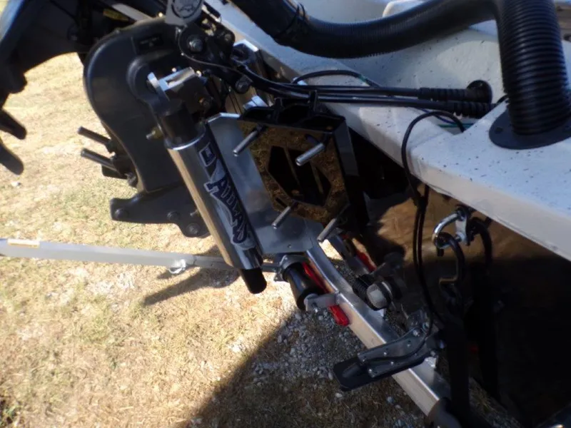 Slide: The Image of 2025 Xpress H24Bay boat engine mount and hydraulic system detail. - 5