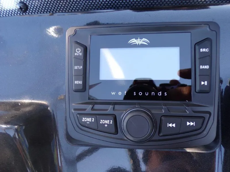Slide: The Image of Wet Sounds audio system on 2025 Xpress H24Bay boat dashboard. - 8