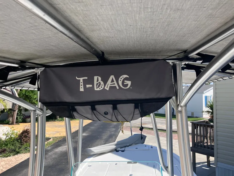 Slide: The Image of 2015 Sea Born FX24 Bay boat with T-top and T-Bag storage. - 12