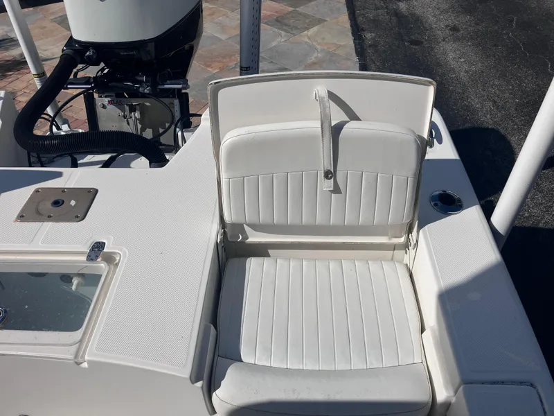 Slide: The Image of 2015 Sea Born FX24 Bay boat seat and engine detail, white upholstery. - 21