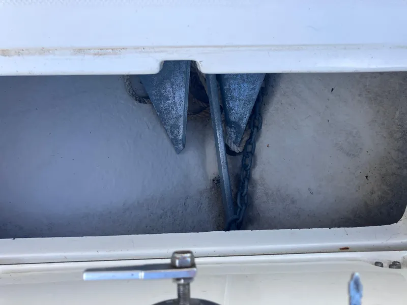 Slide: The Image of Anchor storage compartment on 2015 Sea Born FX24 Bay boat. - 27