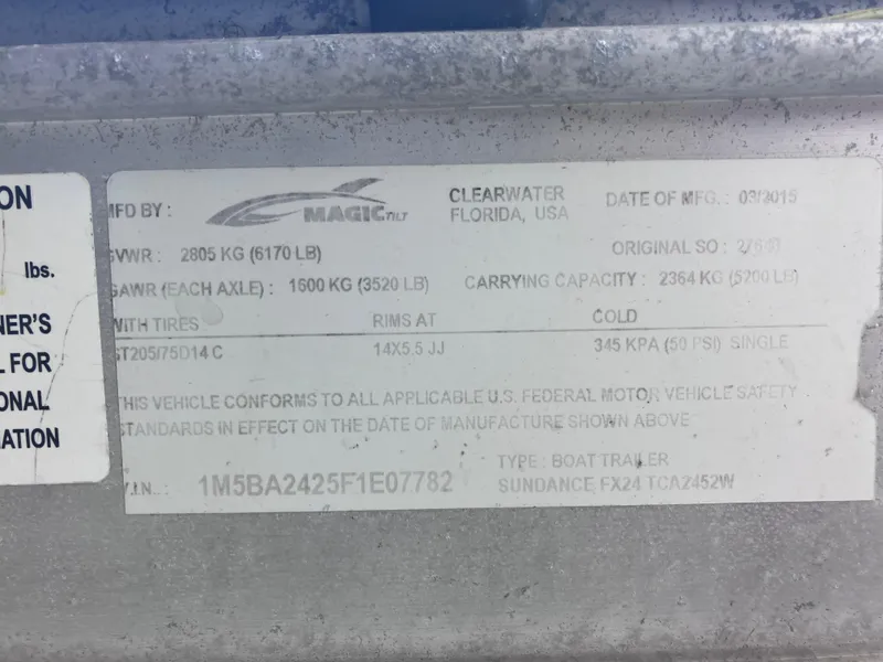 Slide: The Image of 2015 Sea Born FX24 Bay boat trailer label with specifications and compliance details. - 35