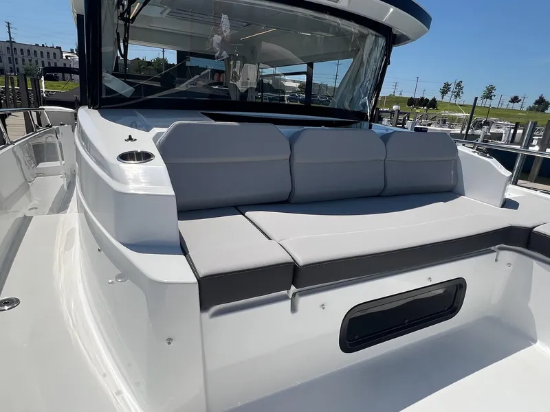 Slide: The Image of 2025 Jeanneau NC 895 Sport S2 boat with sleek seating and modern design. - 17
