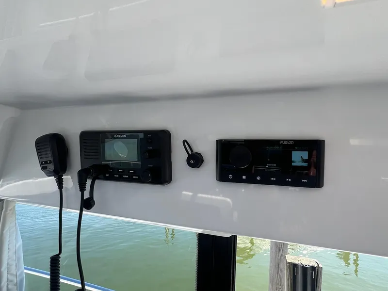 Slide: The Image of Control panel of 2025 Jeanneau NC 895 Sport S2 with Garmin and Fusion systems. - 41