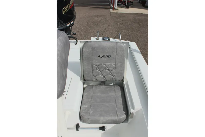 Slide: The Image of Gray seat on 2026 Avid 19 FSX boat, featuring quilted design and logo. - 36