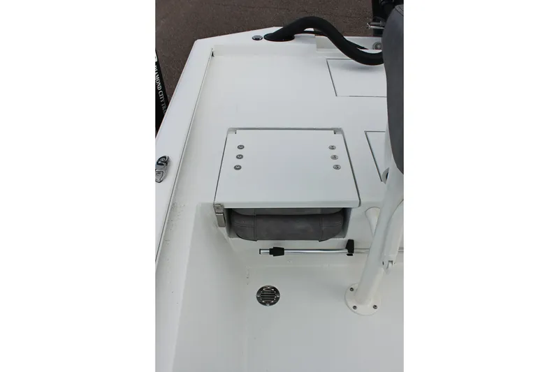 Slide: The Image of 2026 Avid 19 FSX boat deck with storage compartment and seating area. - 40