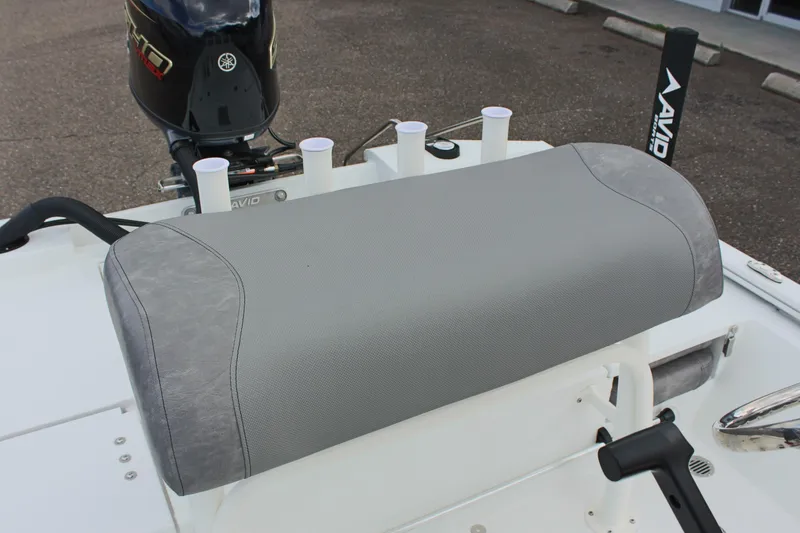 Slide: The Image of 2026 Avid 19 FSX boat seat with Yamaha motor and rod holders. - 43