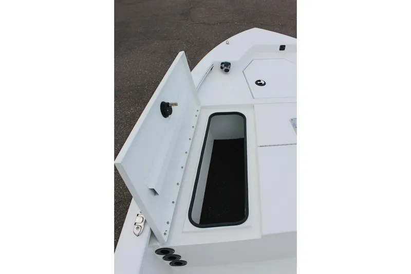 Slide: The Image of Open storage compartment on 2026 Avid 19 FSX boat deck. - 47