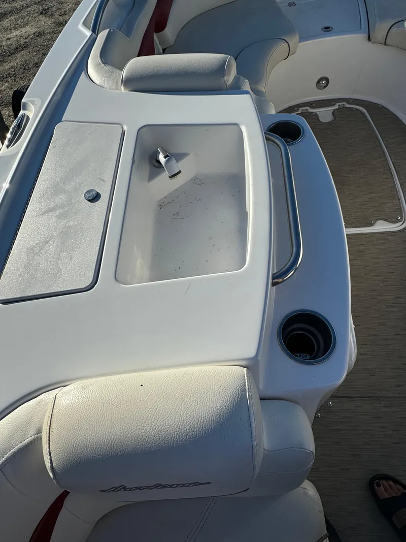 Slide: The Image of Interior of 2013 Hurricane SS 203 OB boat with seating and storage. - 13