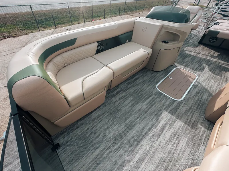 Slide: The Image of Luxurious seating on 2025 Godfrey SW 2286 SFL pontoon boat with elegant interior design. - 10