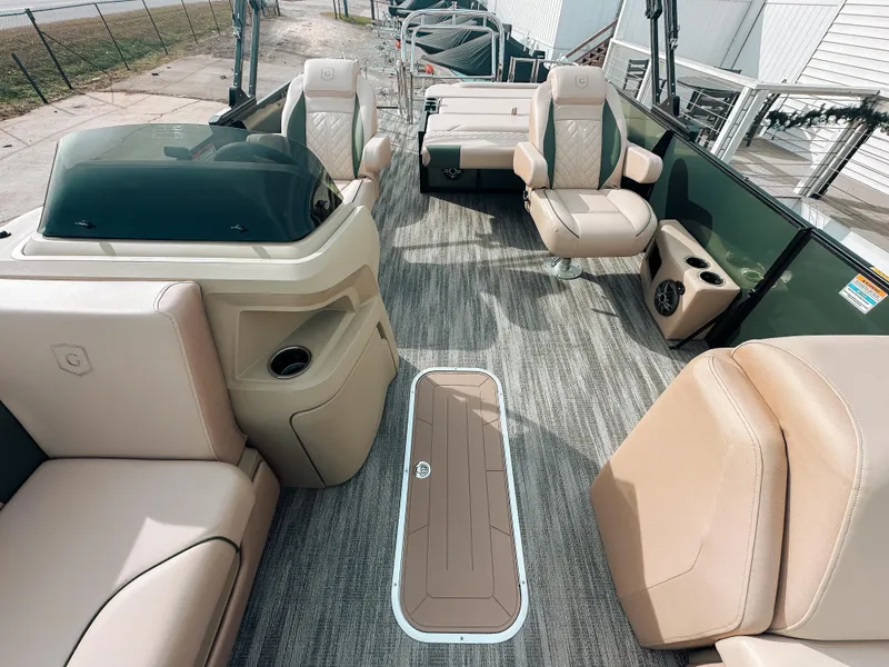 Slide: The Image of Luxurious interior of 2025 Godfrey SW 2286 SFL pontoon boat with plush seating. - 3