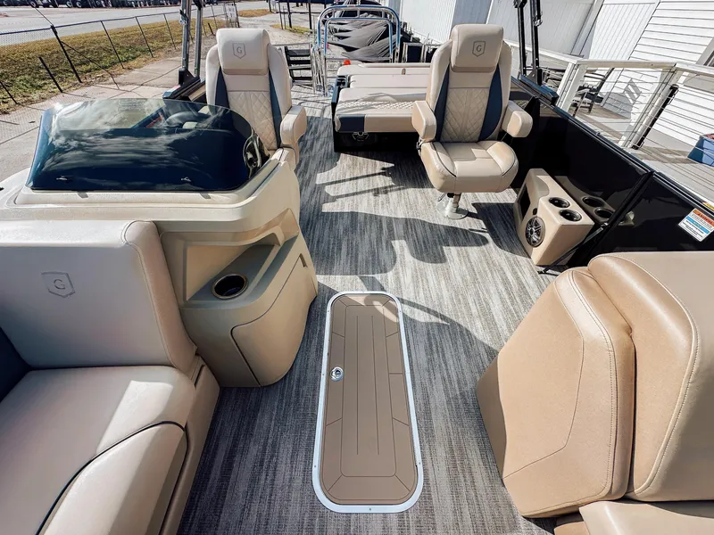 Slide: The Image of 2025 Godfrey Sweetwater 22' Flip Lounge Tritoon interior with beige seating and modern design. - 17