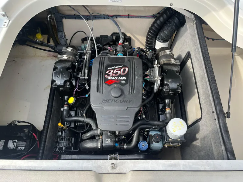 Slide: The Image of 2008 Bryant 239 boat engine, MerCruiser 350 MAG MPI, in engine compartment. - 13