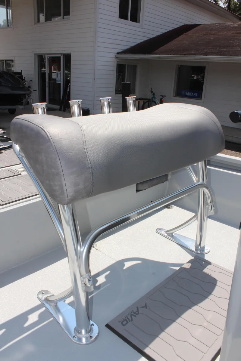 Slide: The Image of 2025 Avid 23 FSX boat seat with sleek metal frame and gray upholstery. - 26