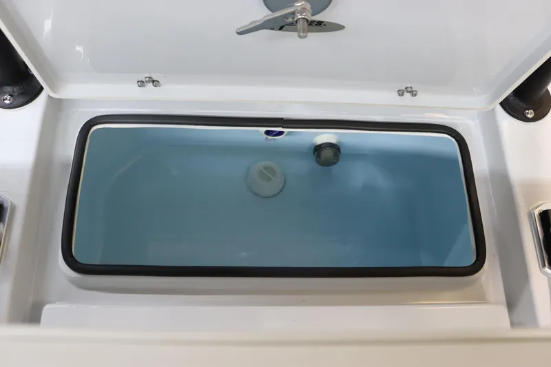 Slide: The Image of Livewell compartment in 2025 Hewes 16 Redfisher boat, featuring a sleek design. - 20