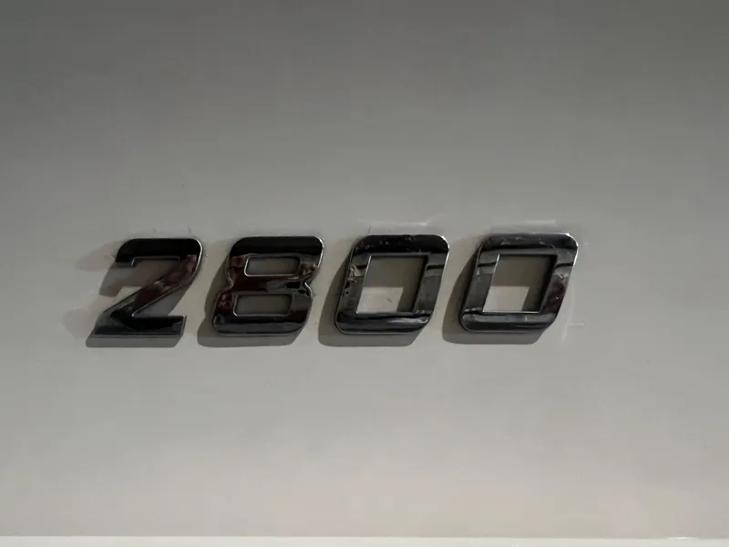 Slide: The Image of Chrome "2800" emblem on 2023 Regal model. - 3