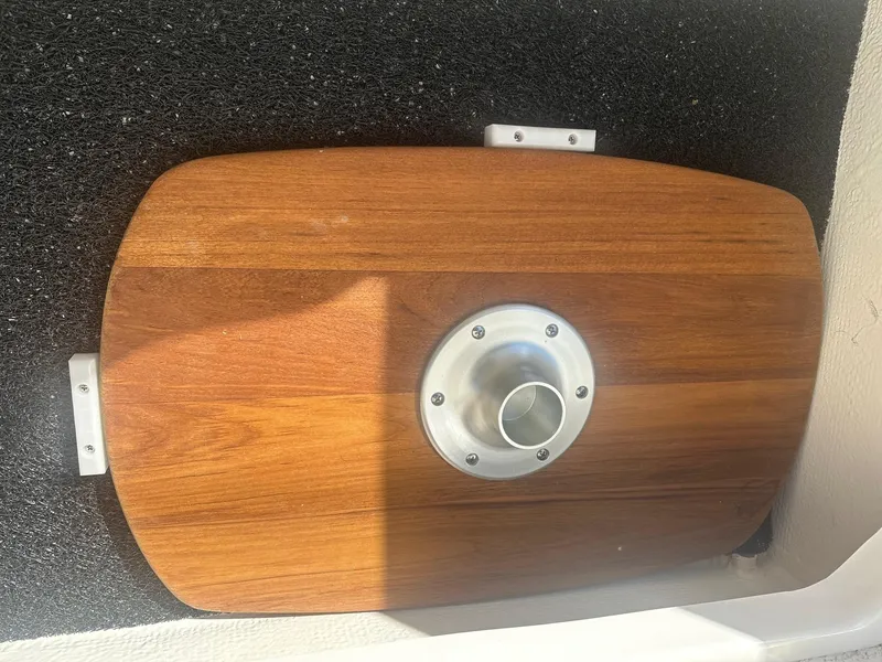 Slide: The Image of Wooden table mount on 2023 Regal 2800 boat interior. - 32