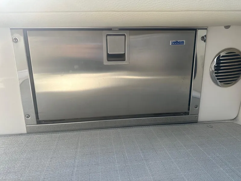 Slide: The Image of Stainless steel Isotherm fridge on 2023 Regal 2800 boat interior. - 33