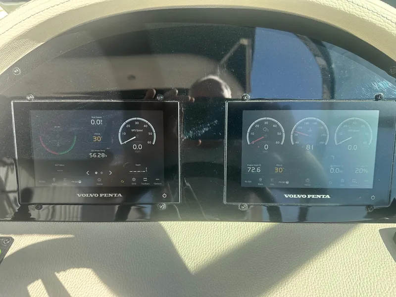 Slide: The Image of Dashboard of 2023 Regal 2800 boat with Volvo Penta digital displays. - 34
