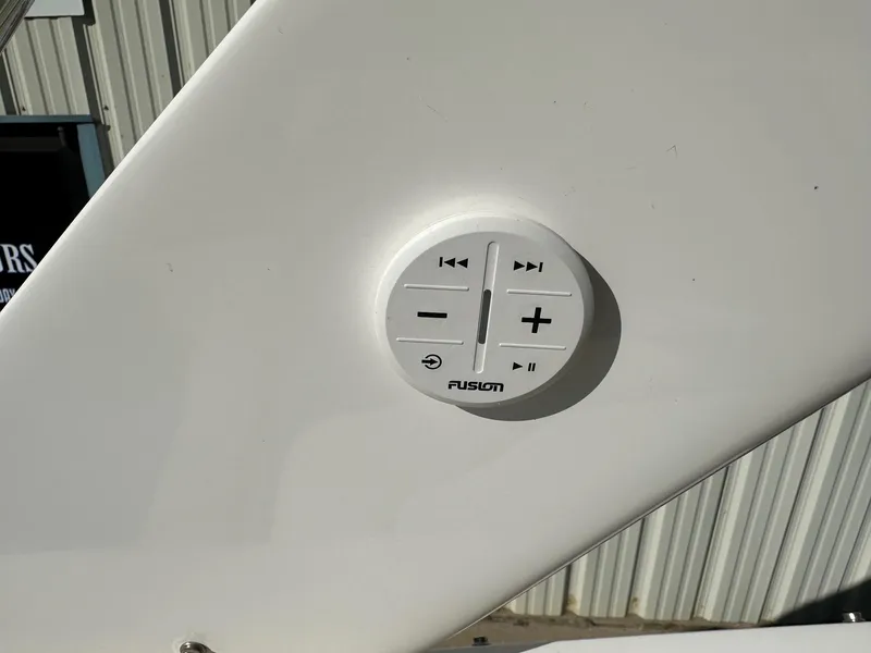 Slide: The Image of Fusion audio control panel on 2023 Regal 2800 boat. - 48