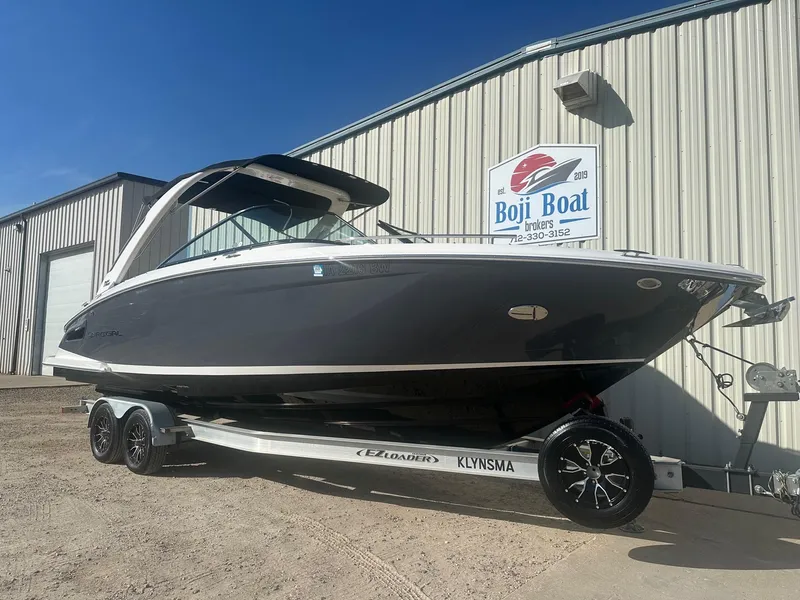 Slide: The Image of 2023 Regal 2800 boat on trailer at Boji Boat Brokers dealership. - 5