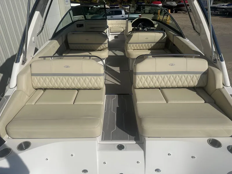 Slide: The Image of Luxurious interior of 2023 Regal 2800 boat with beige seating and modern design. - 8
