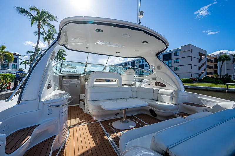 Slide: The Image of Luxurious 2002 Sea Ray 510 Sundancer yacht with spacious seating and sleek design. - 16