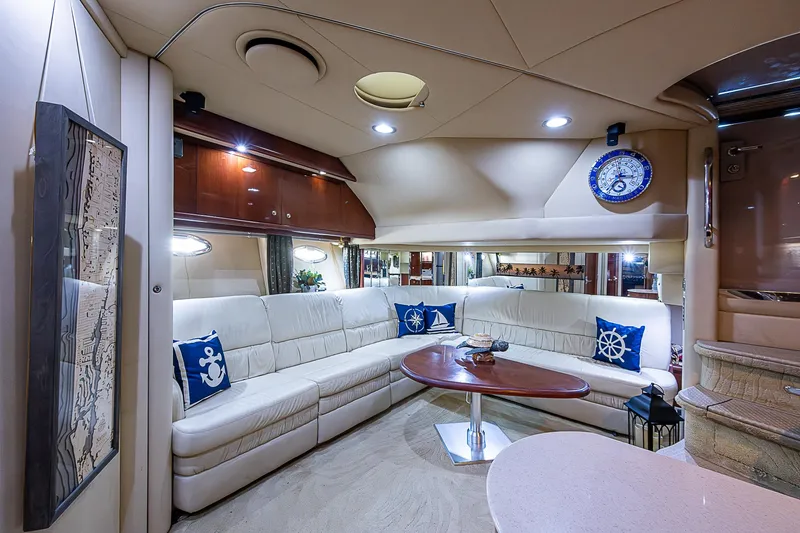 Slide: The Image of Luxurious interior of 2002 Sea Ray 510 Sundancer yacht with elegant seating and nautical decor. - 27