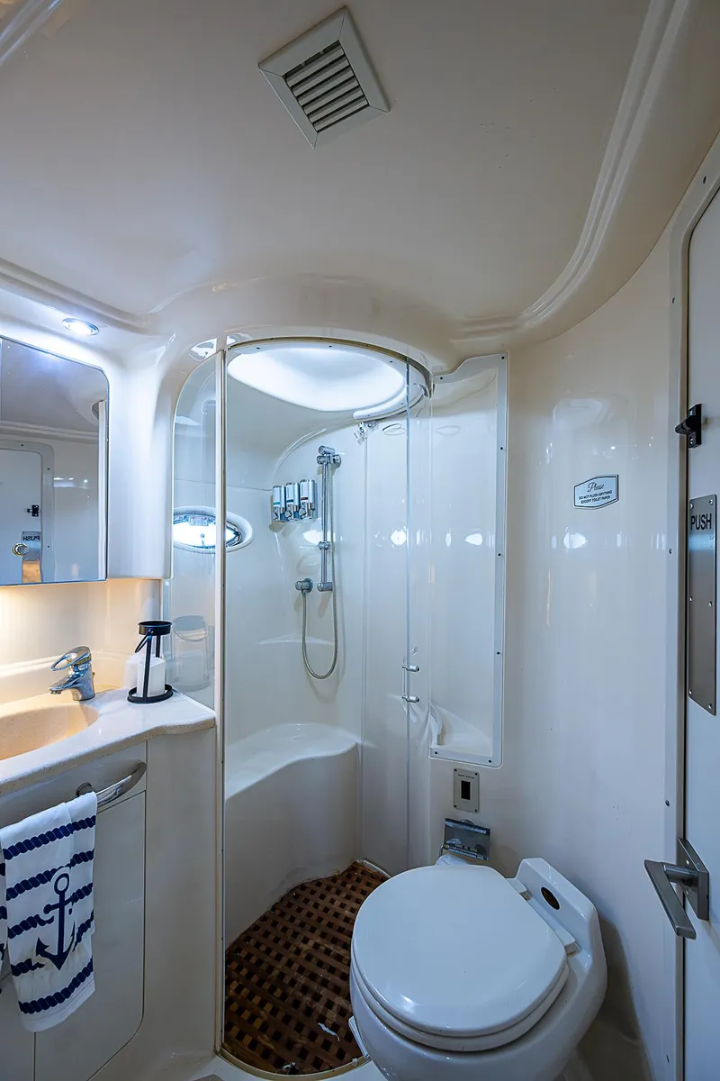 Slide: The Image of Luxurious bathroom in 2002 Sea Ray 510 Sundancer yacht with shower and toilet. - 39