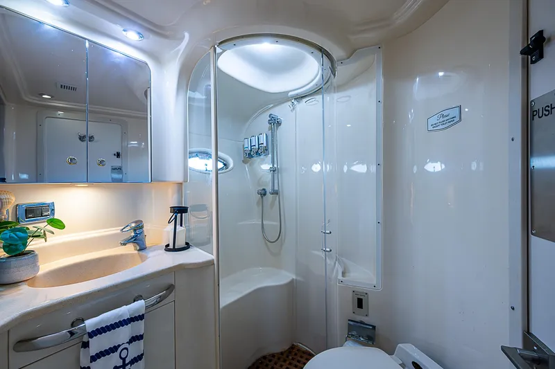 Slide: The Image of Luxurious bathroom in 2002 Sea Ray 510 Sundancer yacht with modern amenities. - 40