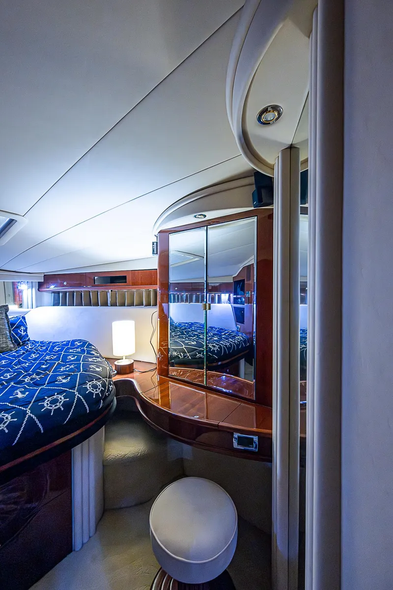 Slide: The Image of Luxurious cabin interior of 2002 Sea Ray 510 Sundancer yacht with elegant furnishings. - 44