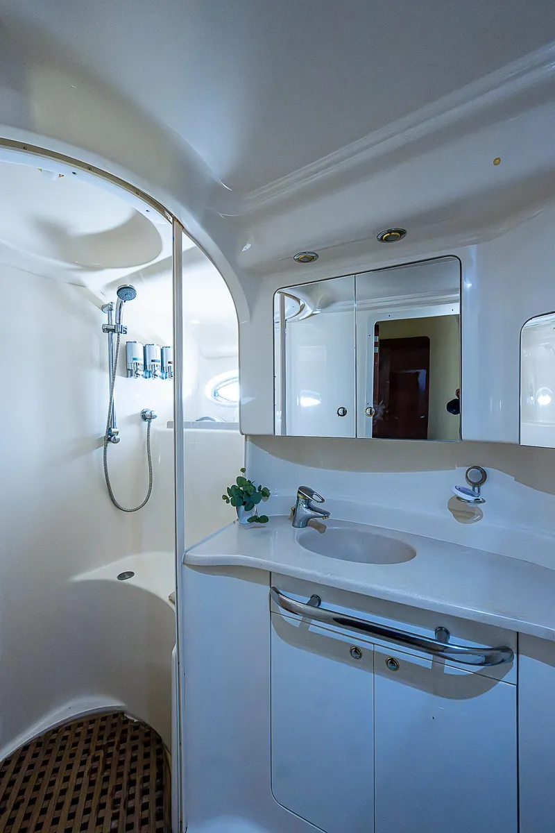 Slide: The Image of Luxurious bathroom in 2002 Sea Ray 510 Sundancer yacht with modern fixtures. - 48