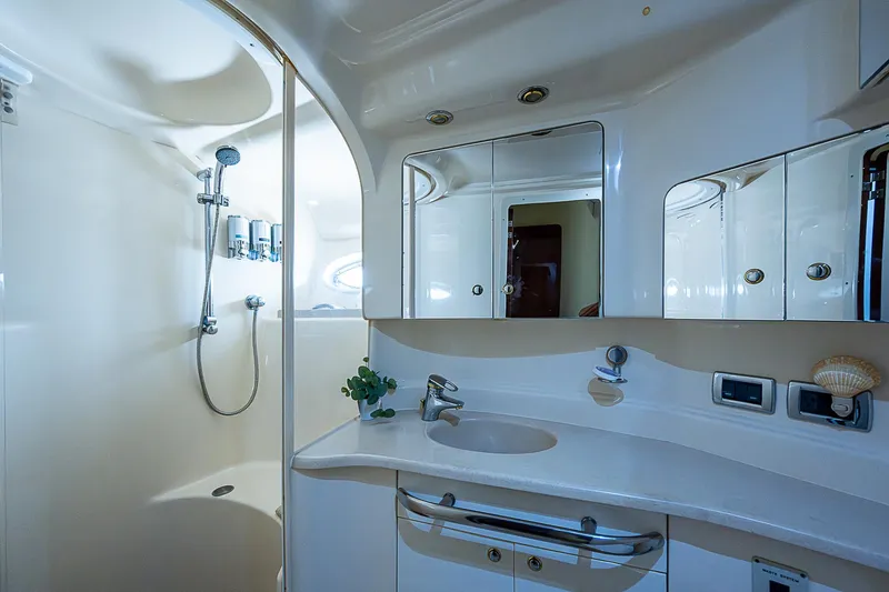 Slide: The Image of Luxurious bathroom in 2002 Sea Ray 510 Sundancer yacht with shower and vanity. - 49