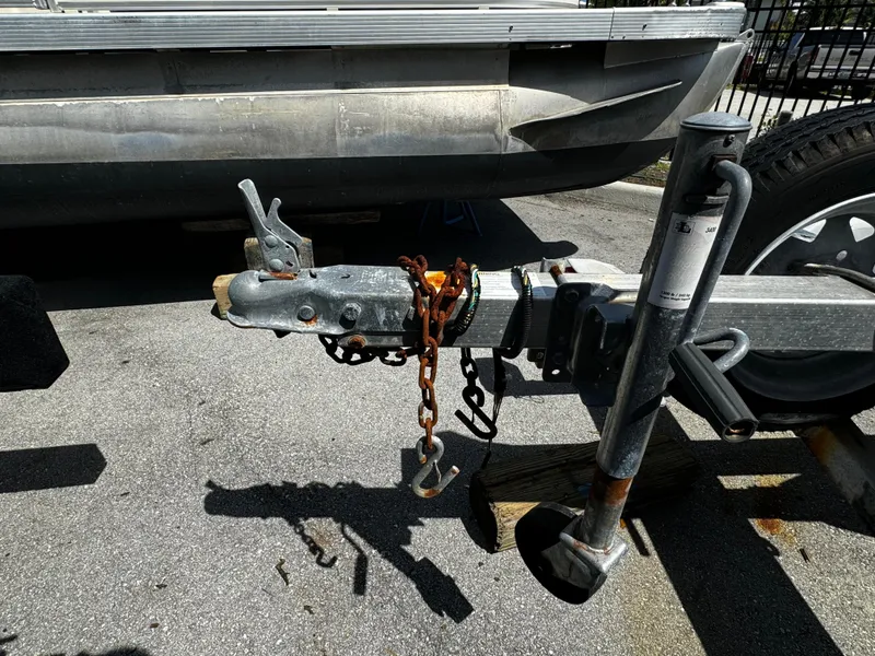 Slide: The Image of 2019 Continental Trailers Single Axel with hitch and safety chain on asphalt. - 9