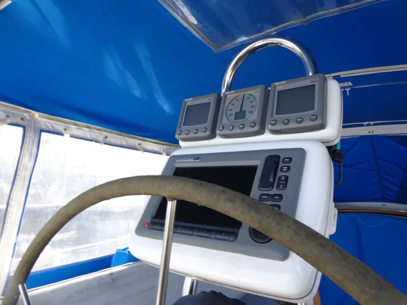 Slide: The Image of Catalina MK-l 1991 yacht cockpit with navigation instruments and blue canopy. - 8