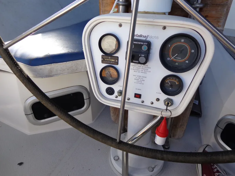 Slide: The Image of Close-up of 1991 Catalina MK-l Double Cabin boat dashboard and steering wheel. - 9