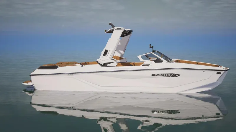 Slide: The Image of 2025 Nautique G25 Paragon boat on calm water, sleek design, luxury features. - 3
