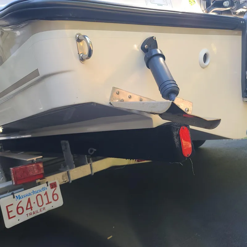 Slide: The Image of 2015 Pursuit DC 235 Dual Console boat on trailer with Massachusetts license plate. - 18