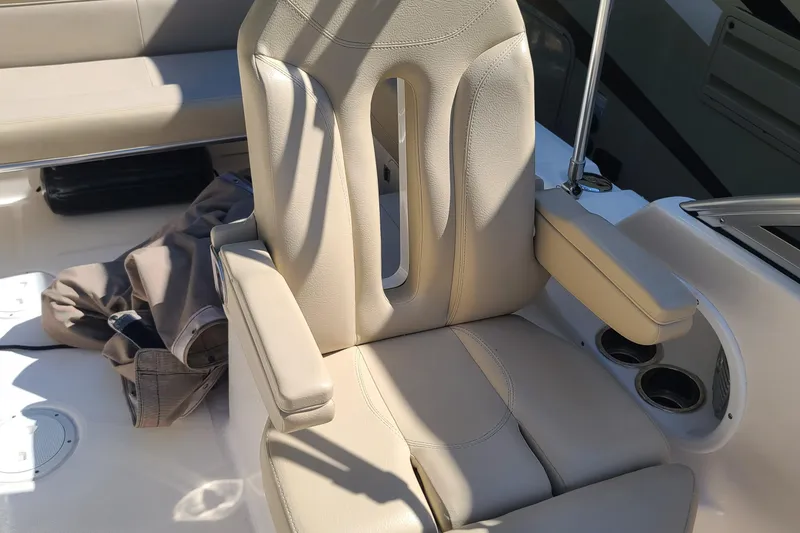 Slide: The Image of Beige captain's chair on 2015 Pursuit DC 235 Dual Console boat. - 27