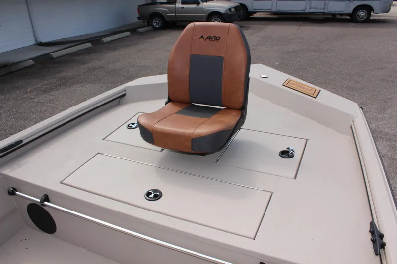 Slide: The Image of 2025 Avid 18 Rogue CC boat with brown and gray seating on deck. - 21